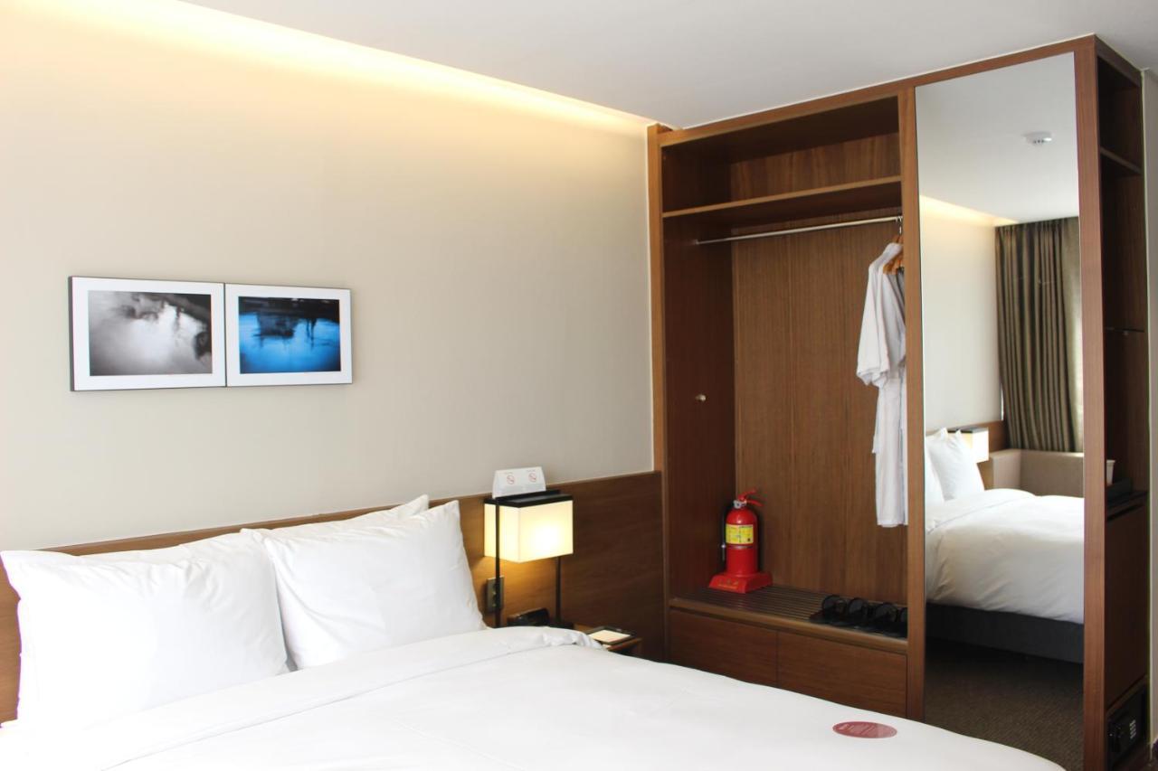 Ramada Encore By Wyndham Busan Haeundae Экстерьер фото
